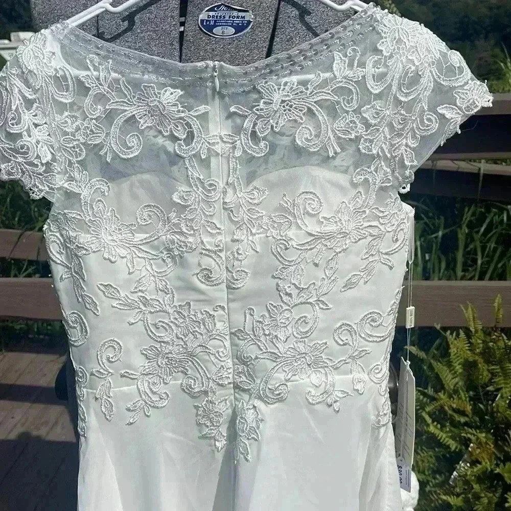 Wedding dress. Size 10. Seems to run small. - Picture 9 of 12